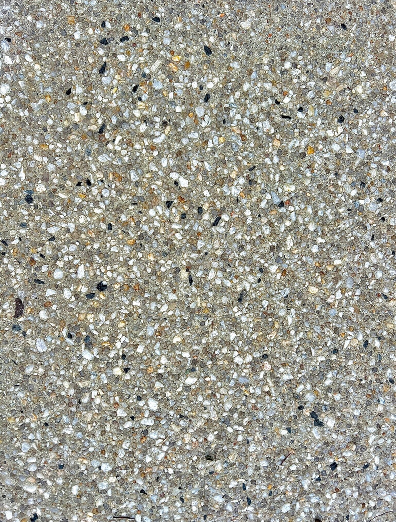 Earthstone exposed aggregate with warm blend of earthy brown, cream and natural stone
