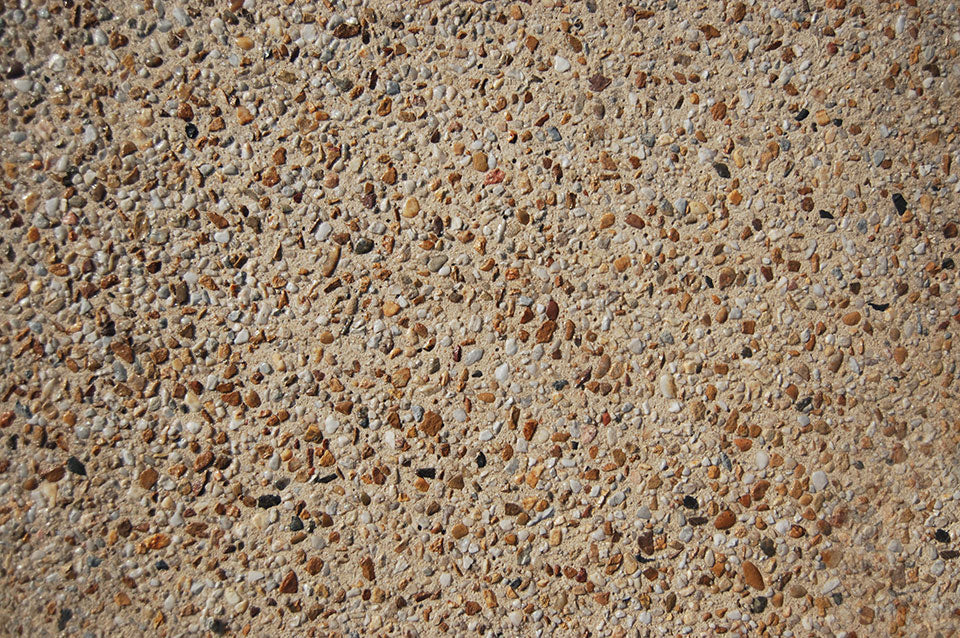 Exposed aggregate concrete driveway at a modern Melbourne home