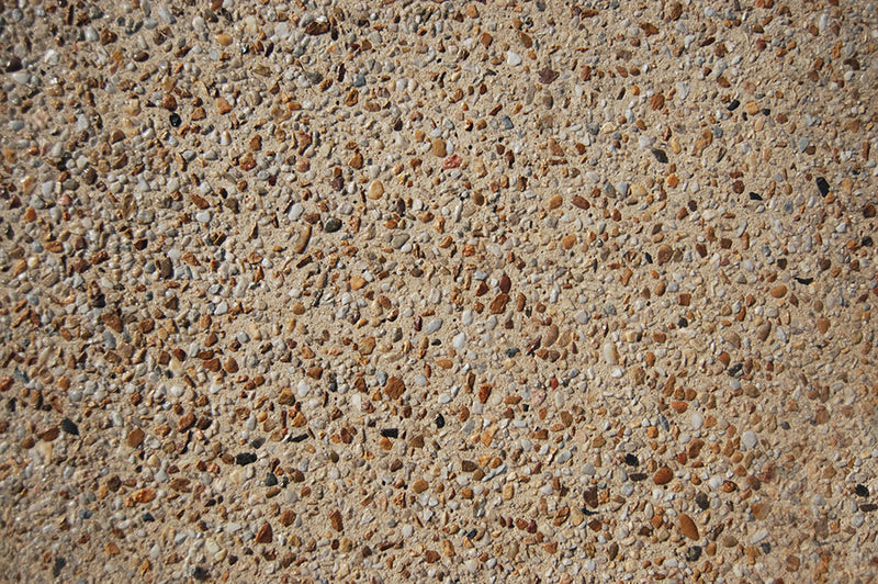 Golden Stone exposed aggregate with warm cream, gold and natural stone tones