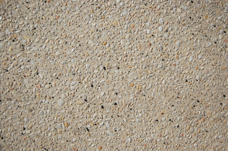 Natural Sand exposed aggregate with warm sandy tones and natural appearance