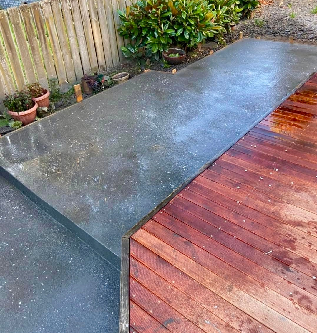 Professionally finished concrete pathway integrated with Melbourne home and landscaping